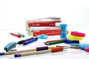 Back to school concept-close up of school supplies on a white background.