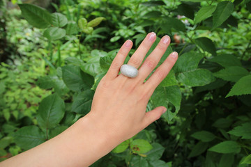 Close up of beautiful woman wearing shiny ring