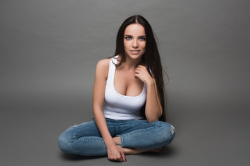Beautiful smiling woman with clean skin, natural make-up, and white teeth with bright smile and...