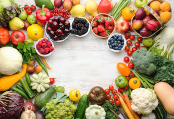 Fresh summer fruits vegetables berries background, cherries peaches strawberries cabbage broccoli cauliflower squash tomatoes carrots beans beetroot, pepper, top view, selective focus