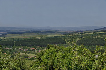 Fototapeta na wymiar View toward residential district Marchaevo and environs of Sofia city at the foot of the mountain Vitosha, Bulgaria 