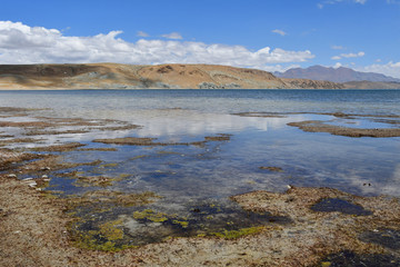 China, Tibet, the clouds are reflected in the sacred lake for Buddhists Manasarovar