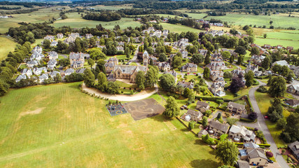 Aerial image over Quarriers village and surrounding countryside in West Central Scotland.