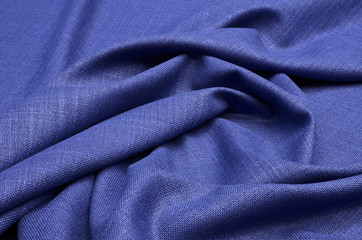 Naklejka na ściany i meble Fabric suit, blue of silk and wool.