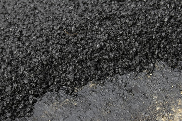 Close-up of tar used in road construction