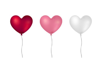 Fototapeta na wymiar Heart shaped helium balloons.