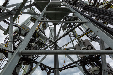 Telecommunication tower with microwave, radio antennas, remote radio units, telecommunication...
