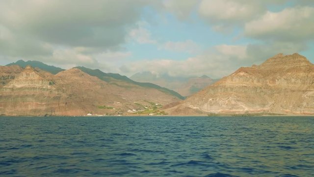 Opening view of ricky clove of Gran Canaria island. View from sailing yacht