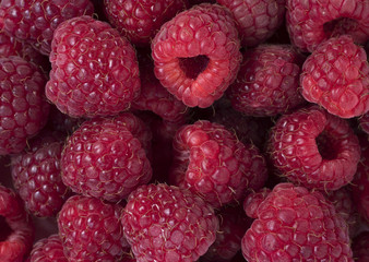 Fresh and sweet raspberries background