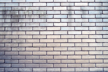texture of a  brick wall background in the countryside . rough blocks of stone brick masonry horizontal .  architecture wallpaper.