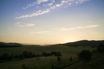 Sunrise and sunset over the hills and town. Slovakia