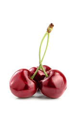 Sweet red cherries isolated on white background macro.