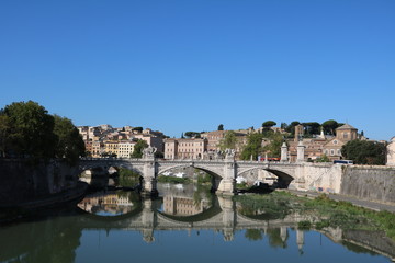 Fototapeta na wymiar View to Vatican city and Statue of Ponte Vittorio Emanuele II in Rome, Italy 