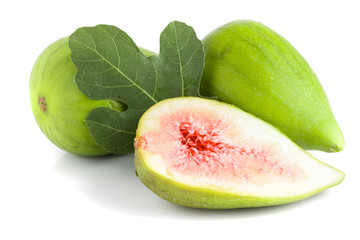 Ripe green fig fruit and half with leaf isolated on white background