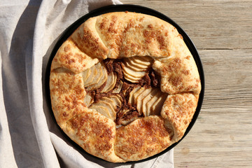 Galette with pear and almond filling. Top view.
