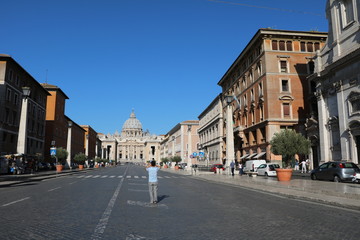 Fototapeta na wymiar Street to Basilika Sankt Peter at St. Peter's Square in Rome, Italy