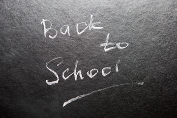 Back to school - words on blackboard with chalk