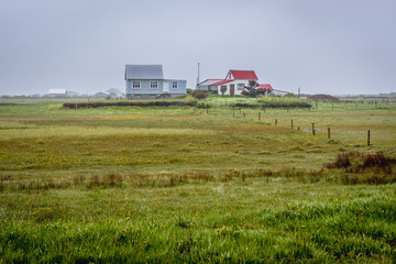 Farm among fields in Eyrarbakki, small village in southern Iceland