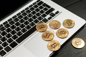 Bitcoin coin symbol on laptop future concept financial currency crypto currency sign
