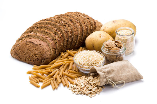 Group of whole foods, complex carbohydrates isolated on a white background