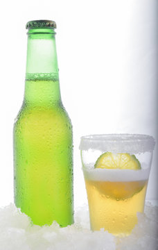 frosty beer on white background