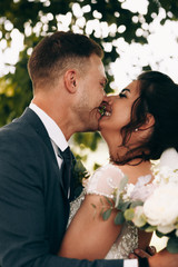 Sensual portrait of a young couple. Wedding photo outdoor