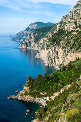 Fototapeta na wymiar Almafi Coast Italy, blue water and cliffs