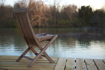 Teak Chair on a Lake Dock