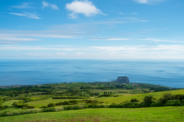Fototapeta na wymiar A view to a landscape and a mount in Faial Island Azores