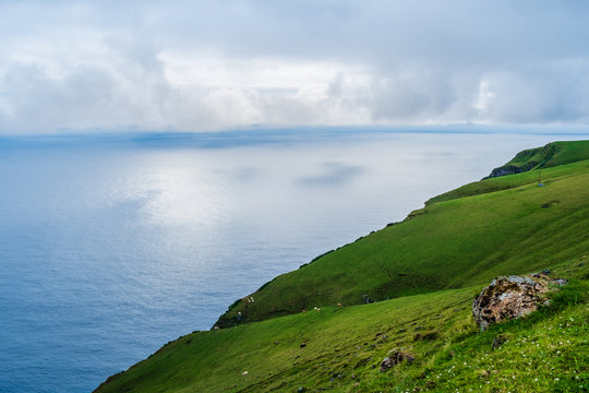 A green coastline in Corvo Island Azores