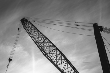 Black and white detail of a Crane and sky