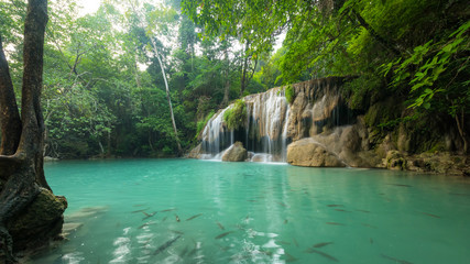 Wonderful green waterfall and nice for relaxation, Breathtaking and amazing turquoise water at the evergreen forest,