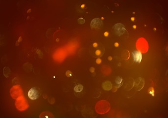 Circular colorful bokeh with dark background.