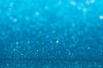 Abstract light blue sparkling glitter wall and floor perspective background studio with blur bokeh.luxury holiday backdrop mock up for display of product.holiday festive greeting card.