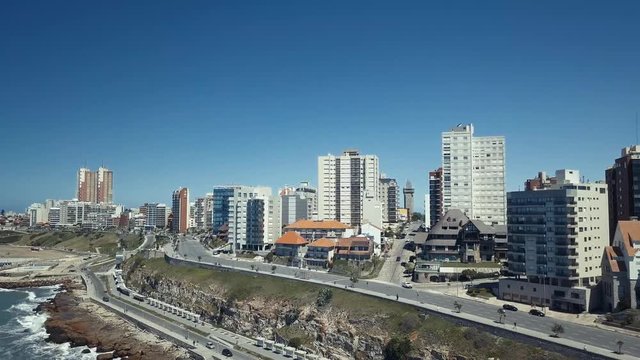 Coast of Mar del Plata Argentina – 4k drone video of the Argentinian coast and downtown area of Mar del Plata Casino Central in spring time.  Buenos Aires Capital Federal district  