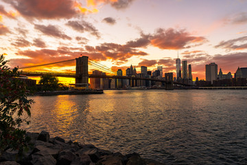 New York Skyline with Brooklyn Bridge Hudson River Manhatten Sun