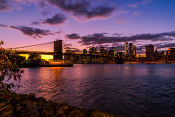 New York Skyline with Brooklyn Bridge Hudson River Manhatten Twi