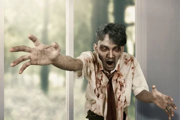 Fotobehang Scary zombie man haunted a house © Leo Lintang
