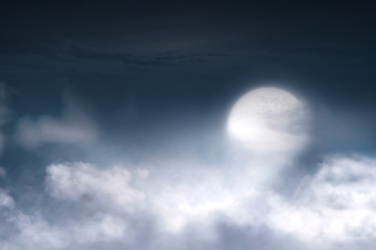 Full moon with cloudscape on the sky
