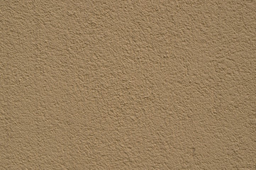 beige textured painted wall. background, architecture.