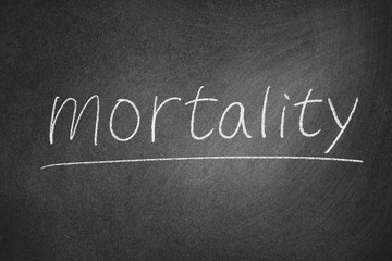 mortality concept word on a blackboard background