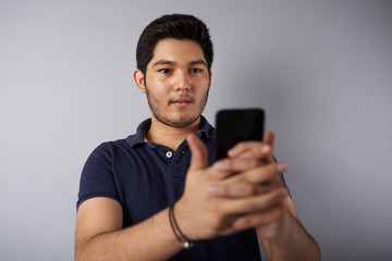 Young man hold smartphone