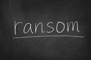 Fototapeta na wymiar ransom concept word on a blackboard background