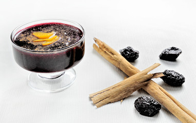 Popular Peruvian desserts called Mazamorra Morada made out of purple corn with cinnamon sticks.