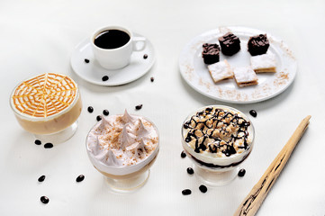 Tasting a cake of many, close-up. Plate with five different sweet desserts. Degustation, choose the dessert for the party or the wedding, the gastronomy, the concept of organization of the event.