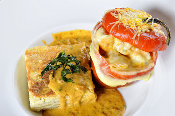 peruvian food: Rocoto relleno a filled pepper with meal and cheese.