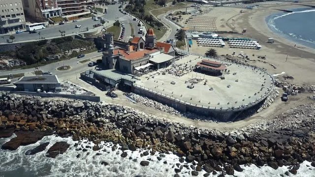 Torreon del Monje coast of Mar del Plata Argentina &ndash; 4k drone video of the Argentinian coast and downtown area of Mar del Plata Casino Central in spring time.  Buenos Aires Capital Federal district  