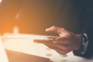 businessman working with smartphone in modern office