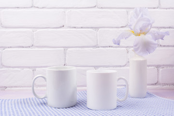Fototapeta na wymiar Two coffee mug mockup with iris flowers