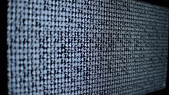 Computer ascii codes on screen running fast like Matrix, hacking, programming, virus atack or cyber crime